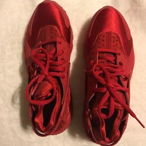 All red Nike huraches